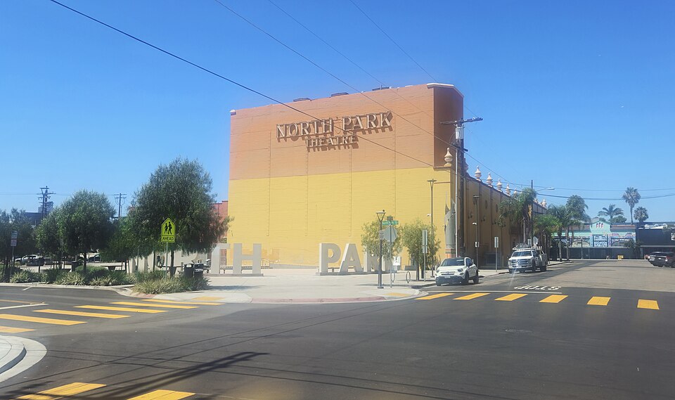 North Park Mini Park and the historic North Park Theatre sign in daylight